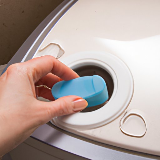 Clean the Washing Machine Dispenser with a Soft Brush