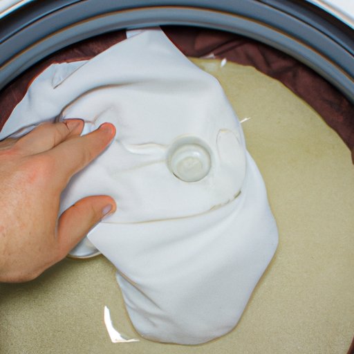 Step 4: Soak a Cloth in Vinegar and Wipe Down the Interior Walls of the Washer