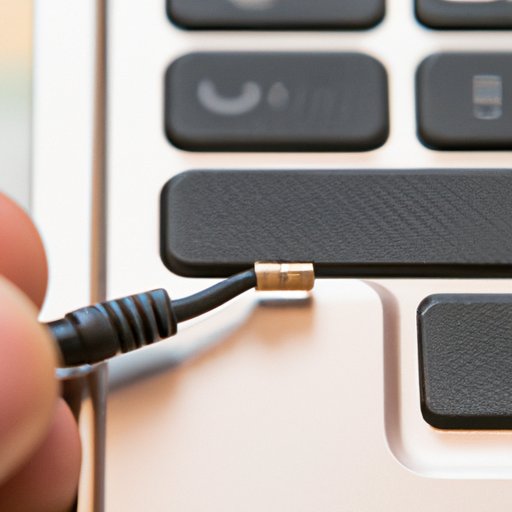 Connect the earbuds to your laptop via a 3.5mm audio jack 