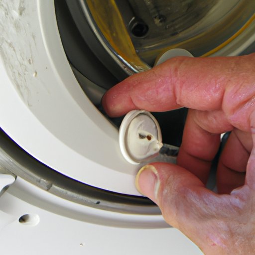 5. Loosen the Screws Holding the Washer and Dryer in Place