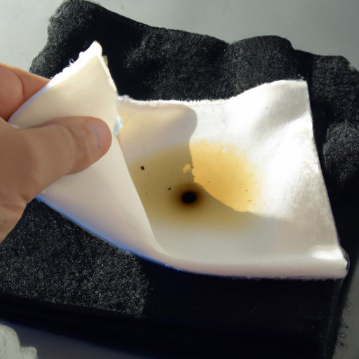 Step 1: Use a damp cloth to blot the area and absorb as much of the oil as possible
