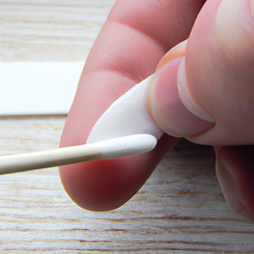 Gently Scrape Off the Glue with a Cotton Swab or Manicure Stick