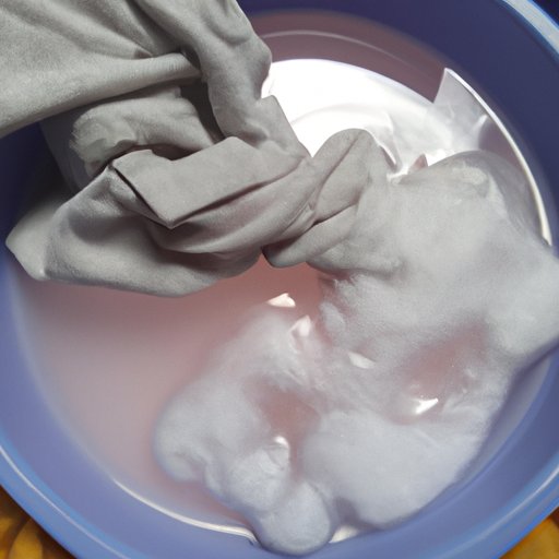 Soak the Fabric in a Mixture of Warm Water and Laundry Detergent