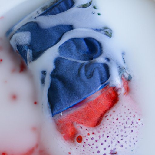 Soak Stained Item in Hot Water and Laundry Detergent