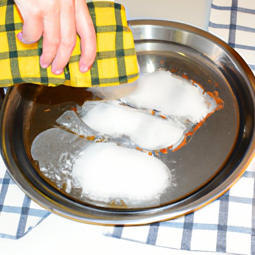 Solution 4: Sprinkle salt or cornstarch onto the grease and let it sit for 15 minutes before wiping away with a damp cloth