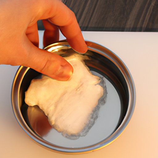 Solution 7: Make a paste of baking soda and hot water and spread it over the grease. Let it sit for 15 minutes before wiping away