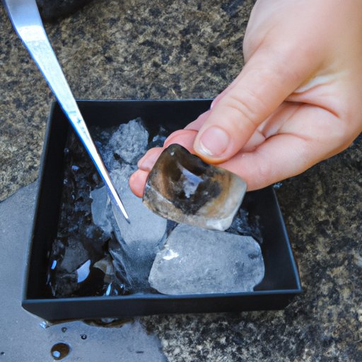 Freezing the Tar With an Ice Cube and Chipping It Off