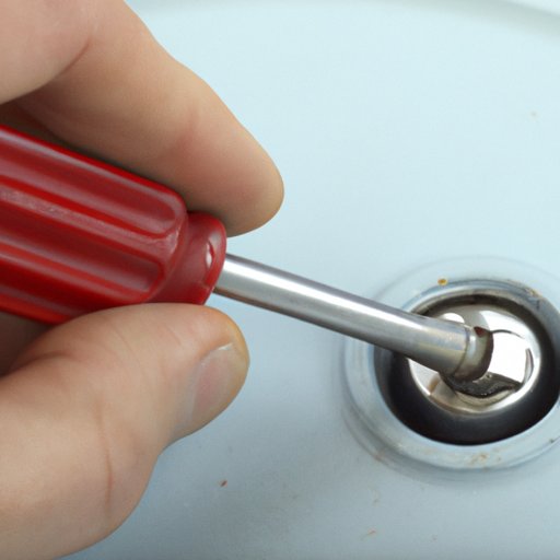 Leverage the Cap Off with a Flathead Screwdriver