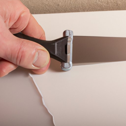 Step 5: Use a Putty Knife for Cutting Through Sealant and Caulk