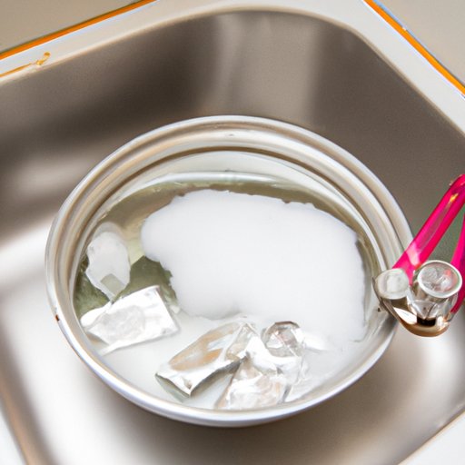 Place an Open Container of Baking Soda in the Sink Overnight