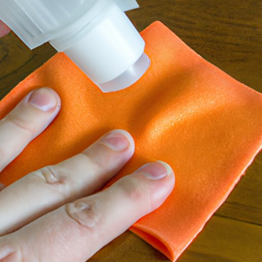 Using a Citrus Based Cleaner and a Cloth to Loosen the Adhesive