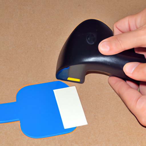 Peel Away the Sticker with a Credit Card or Other Hard Plastic Tool