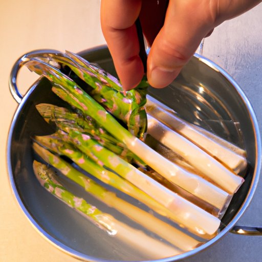 Placing Asparagus in a Bowl or Container with Water