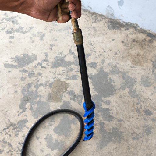 Use an Auger or Snake Tool